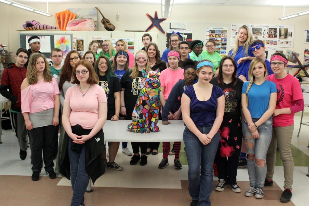 art students with cat they painted