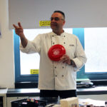 CHef talking to students