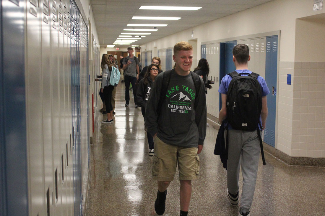 students walking in the high school hallways