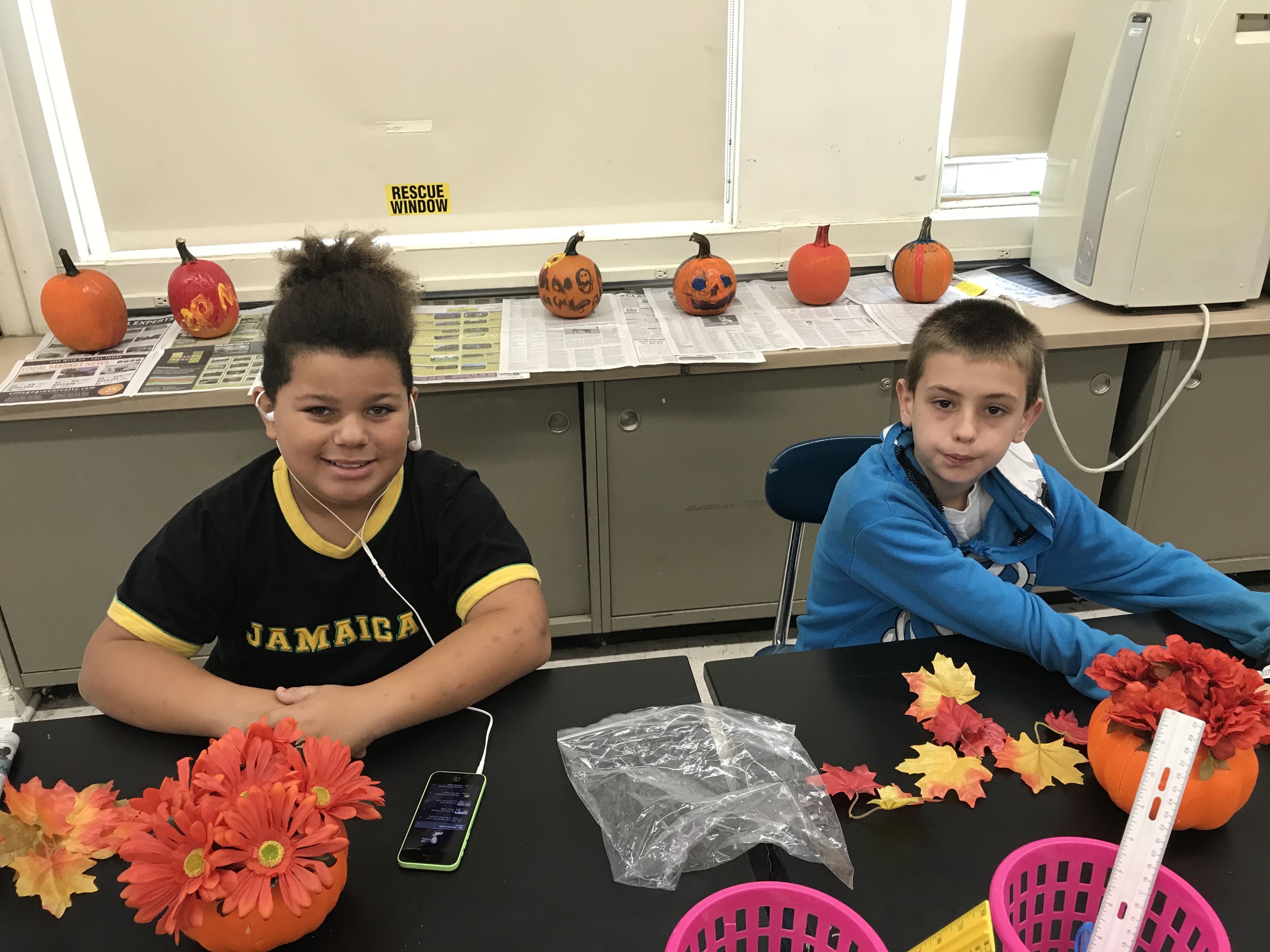 studentrs making fall crafts