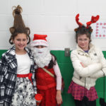 students dressed like whoville resient, santa, and reindeer