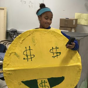 student dressed as emoji