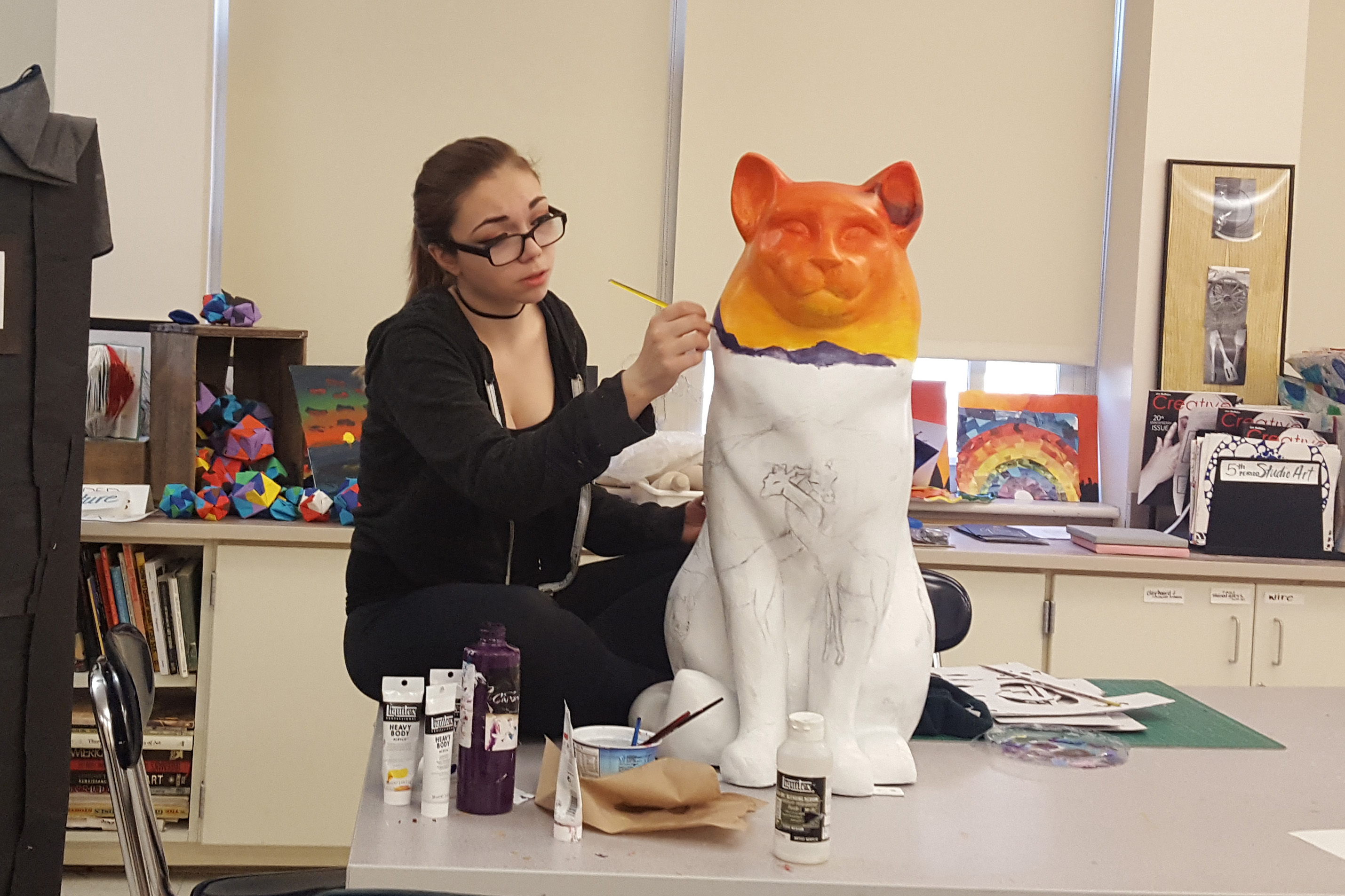 Student painting Cat