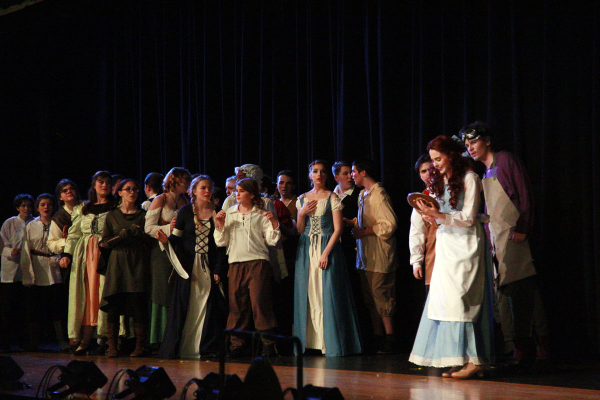 townsfolk sing with Belle