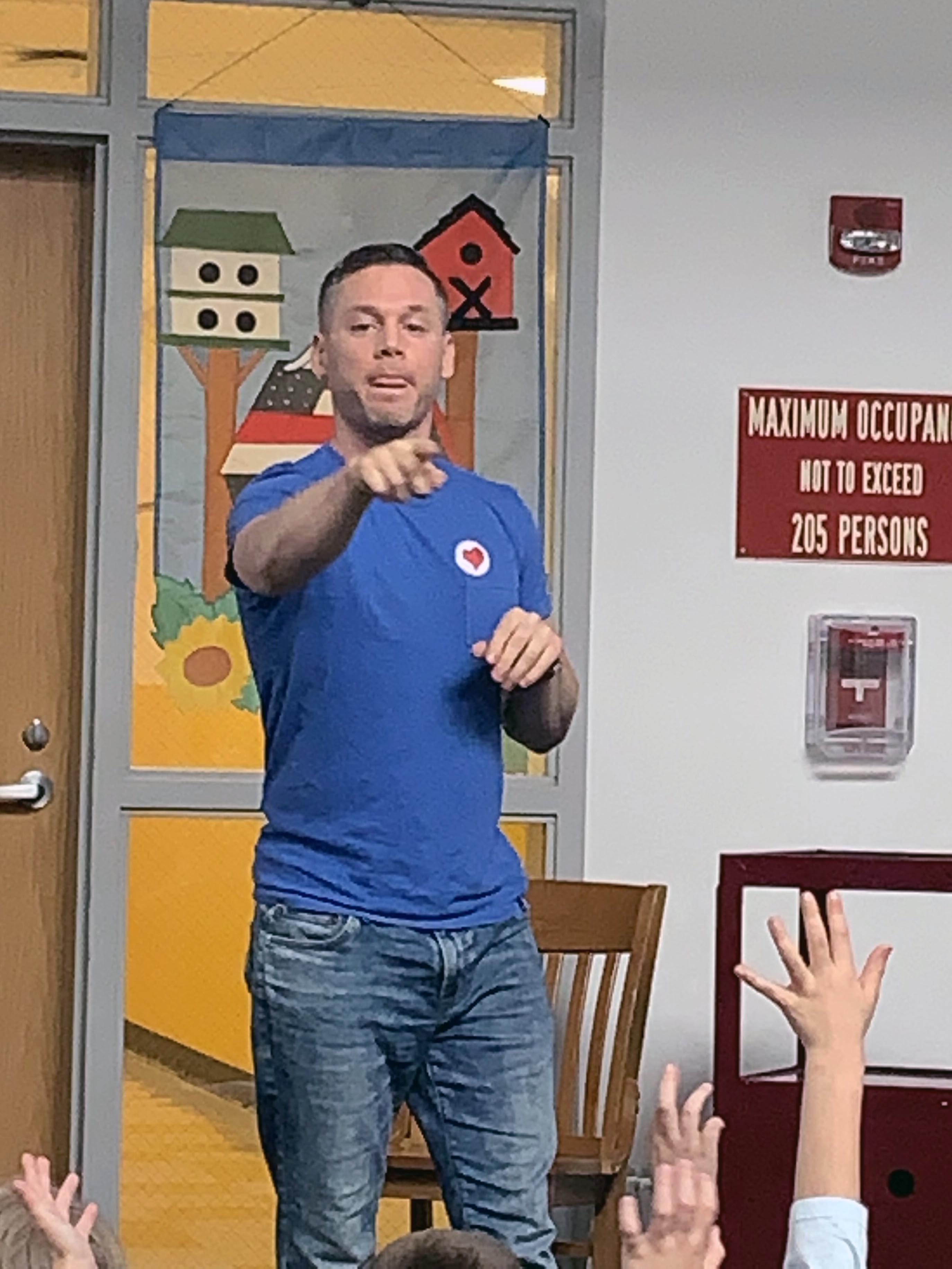 Dan Sadlowski pointing to students