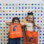 two girls holding Catskill CSD bags