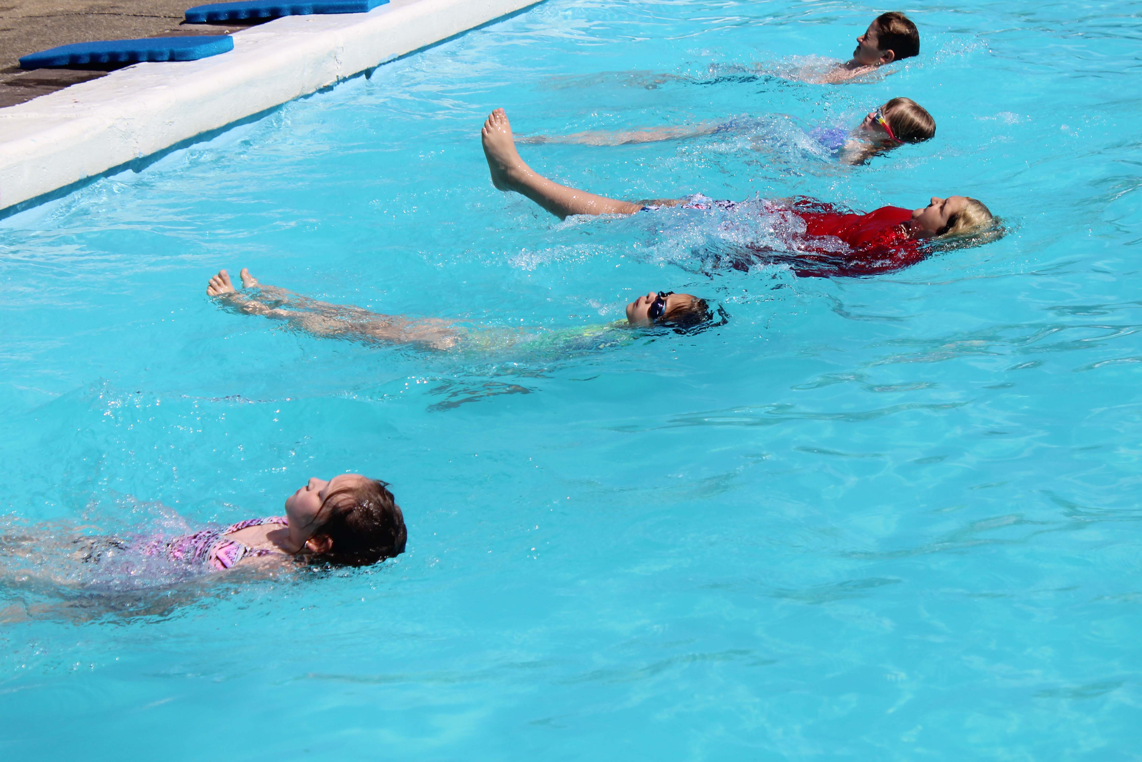 students doing backstroke