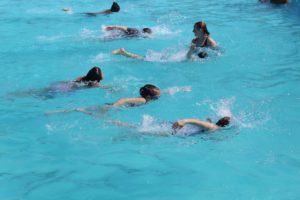 students swimming