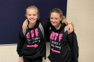 two girls wearing matching BFF shirts