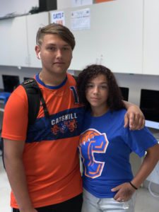 boy and girl wearing catskill athletic shirts