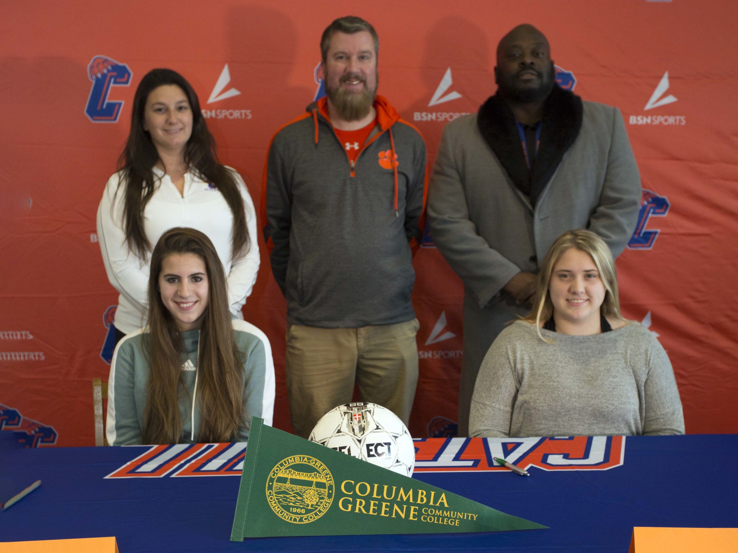 Laura Christman and Kelsey Lackie with Catskill coach Coach Caitlyn Dodig, athletic director Eric Joyce, and superintdent Dr. Ronel Cook