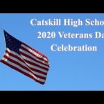 American Flag and words Catskill High Scdhool Veterans Day Celebration
