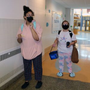 two girls wearing pjs