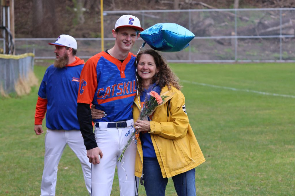 baseball player with parent