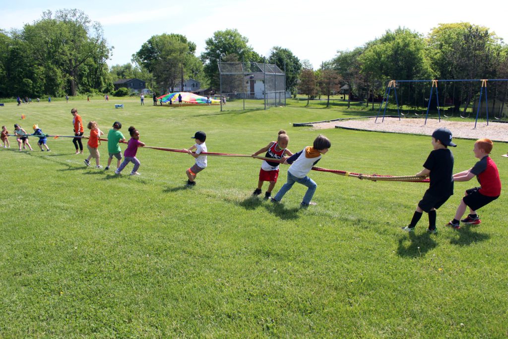 students playing tug of war