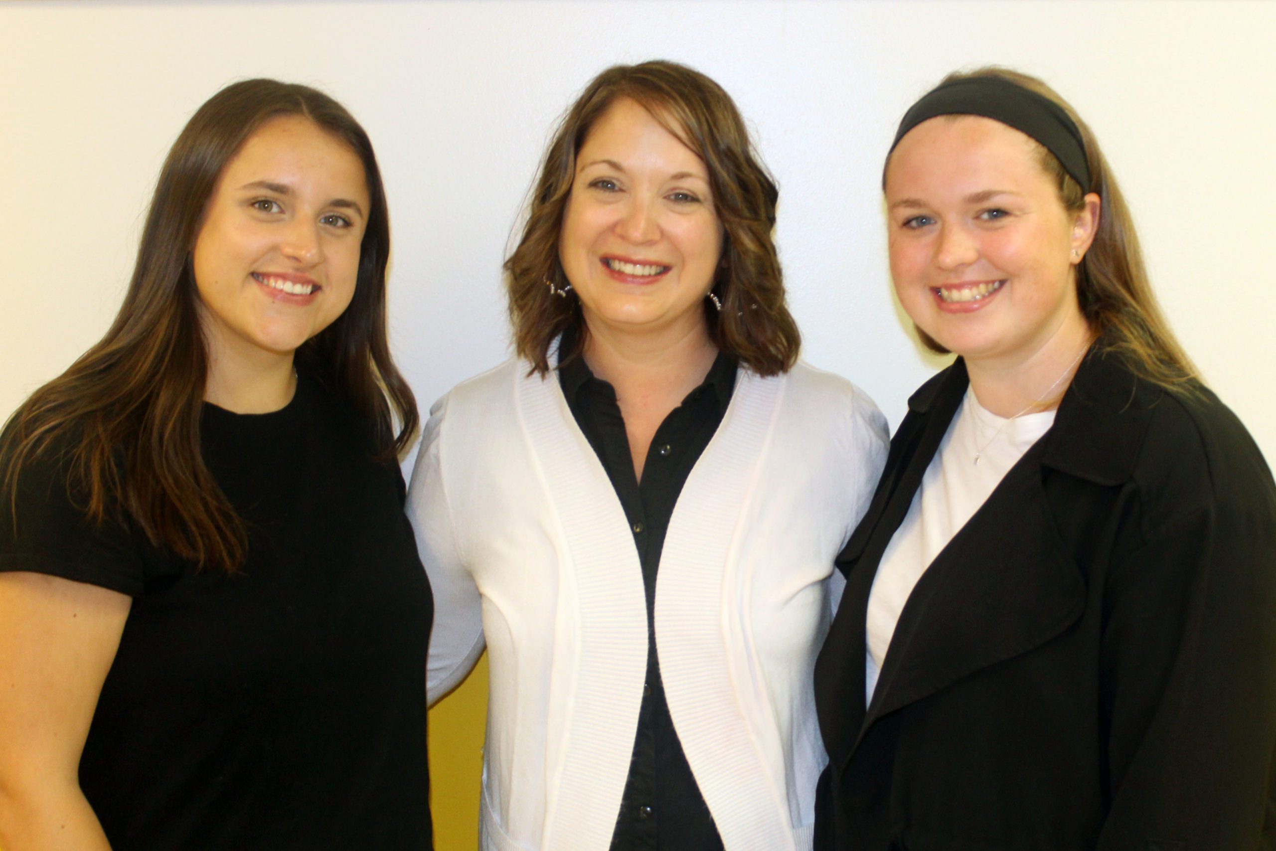 three women smiling