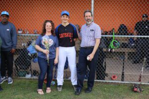 baseball player posing with family