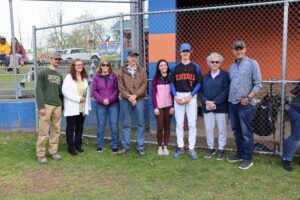 baseball player posing with family