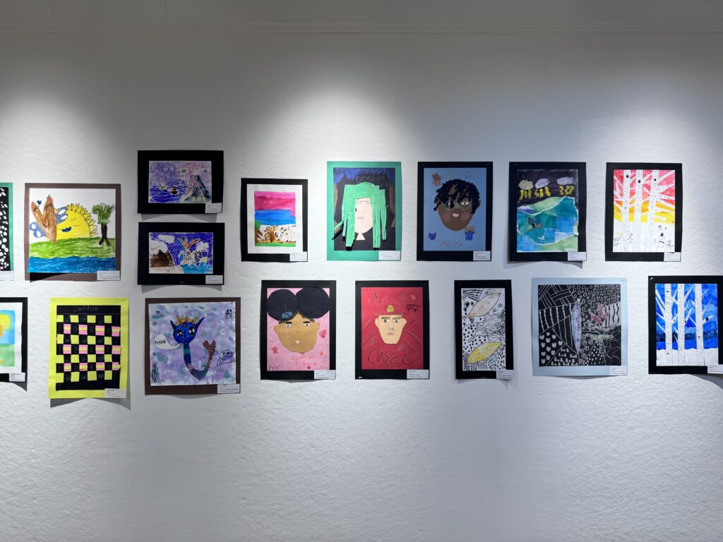 student paintings on wall