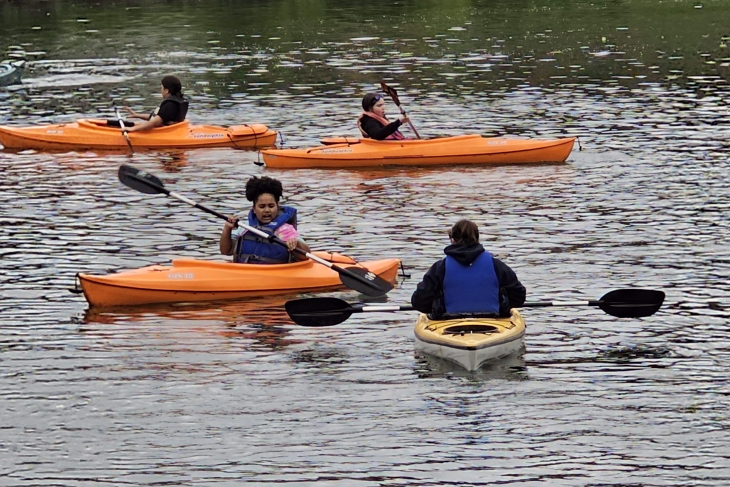 students kayaking