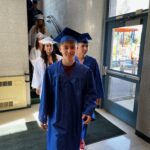 seniors walk through CES hallway