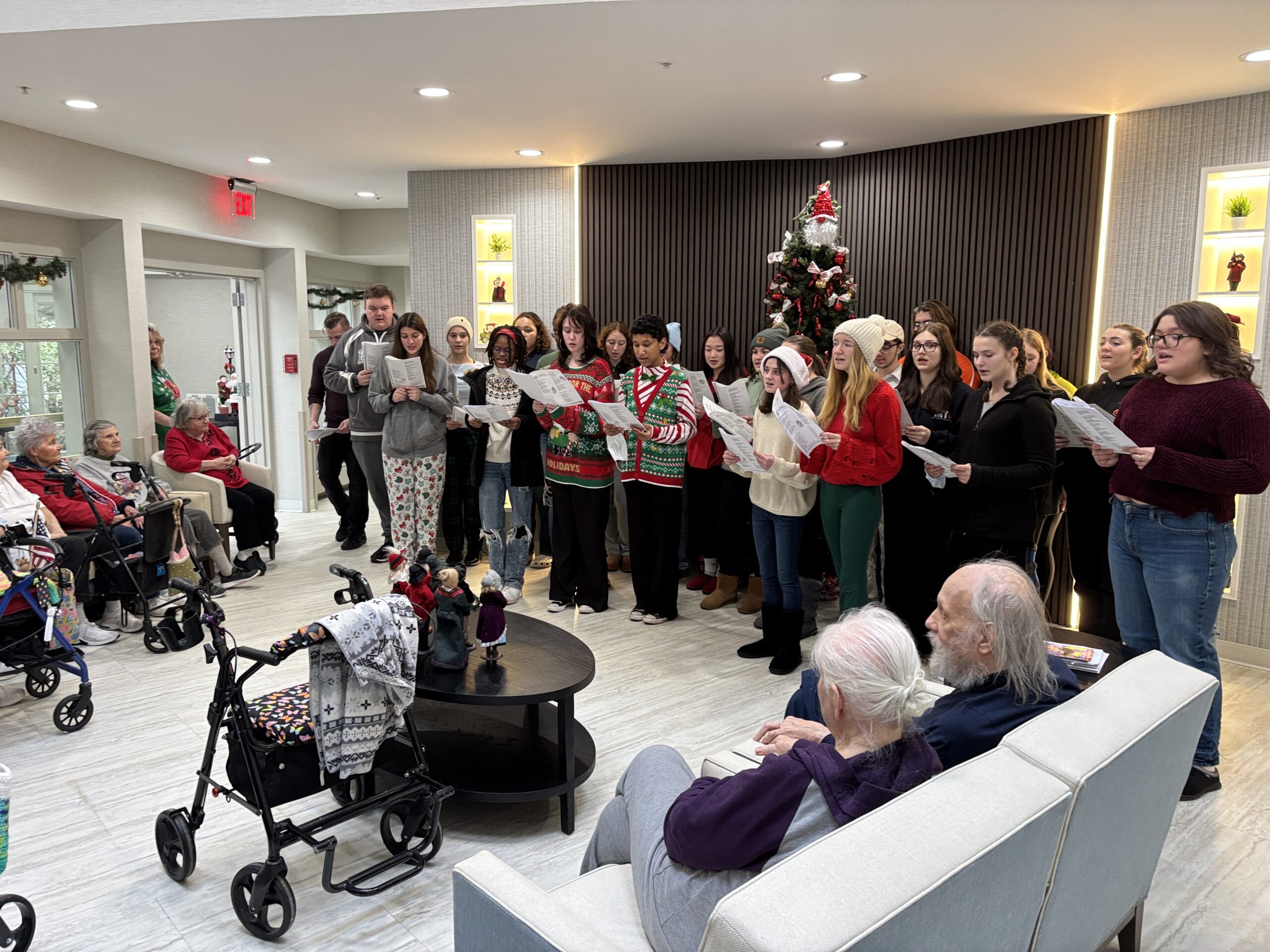 students signing in senior center