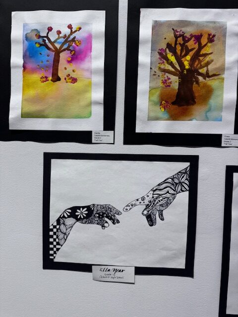 student artwork on gallery wall