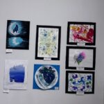 student artwork on gallery wall