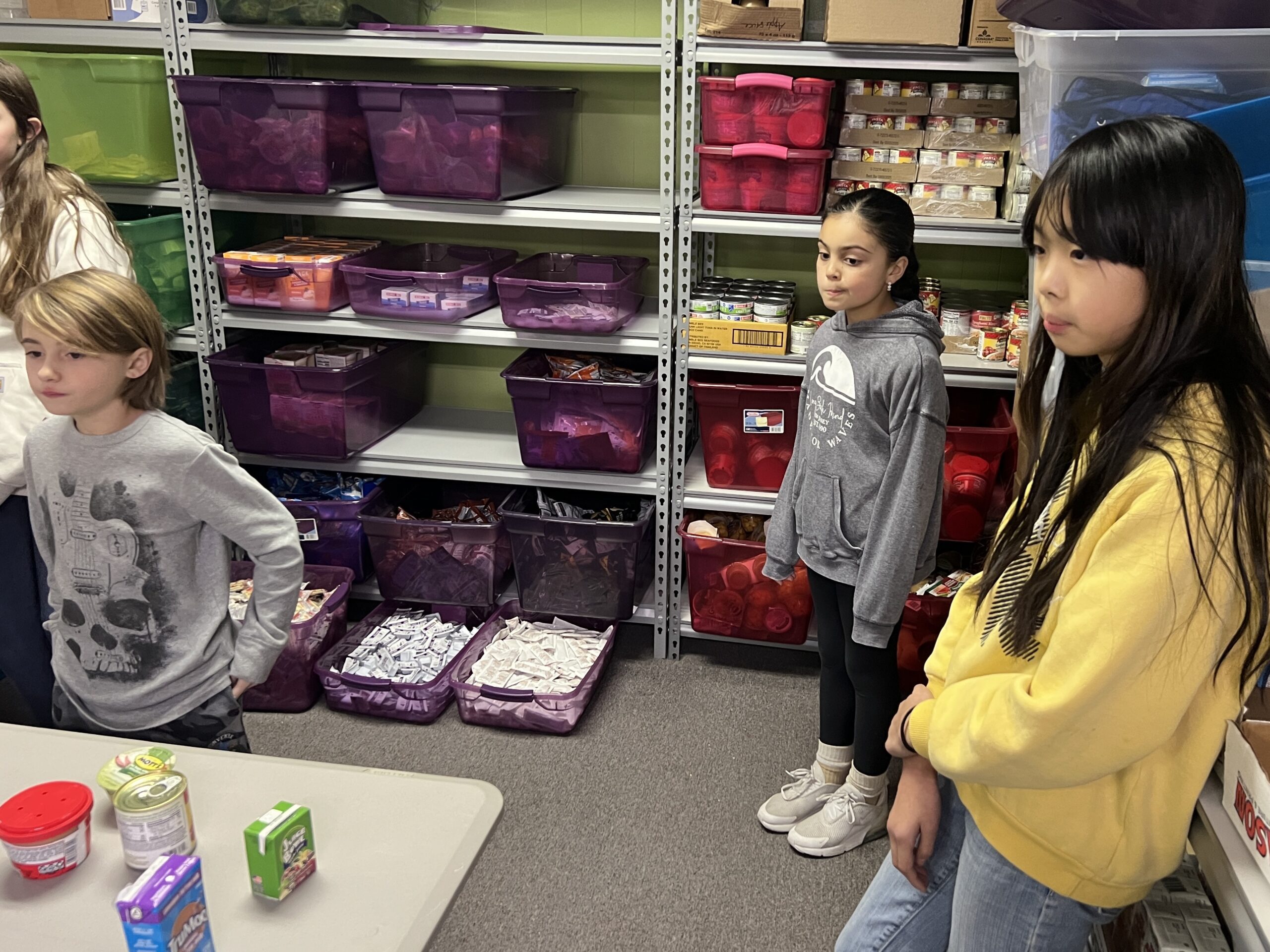 students helping at food pantry