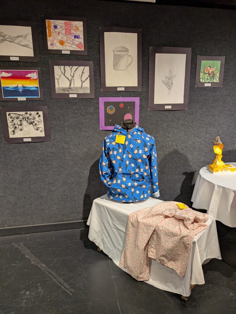 clothes and artwork on display