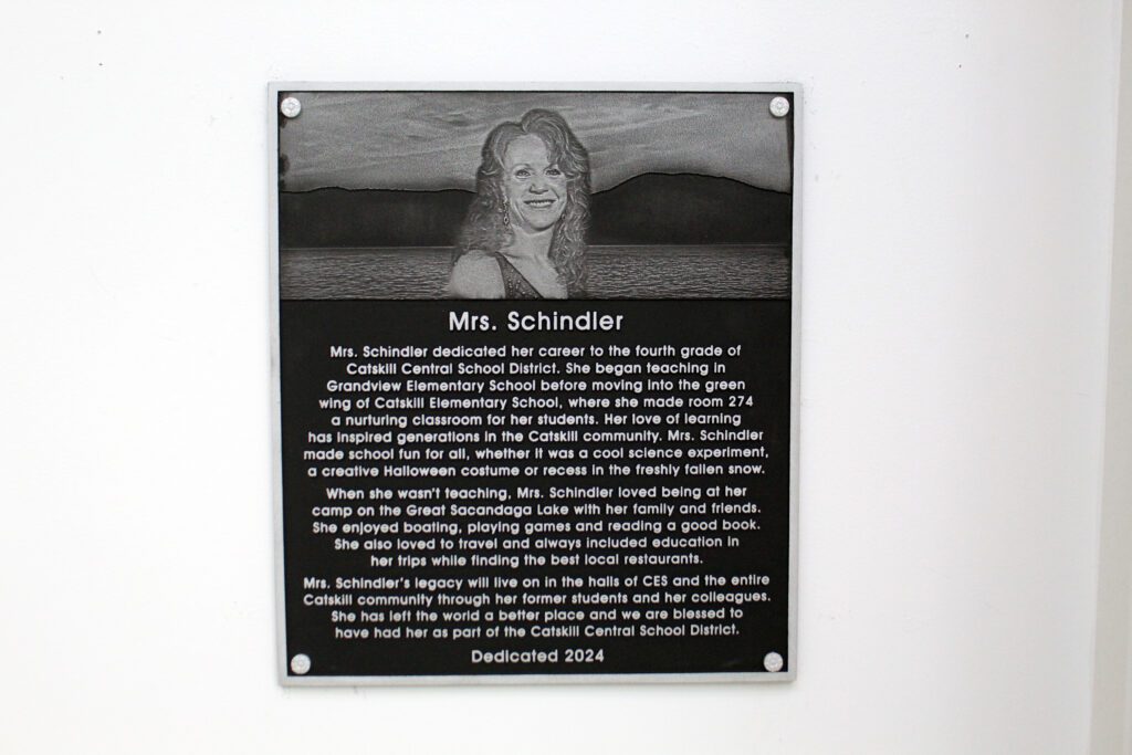 plaque with image of Heather Schindler on it