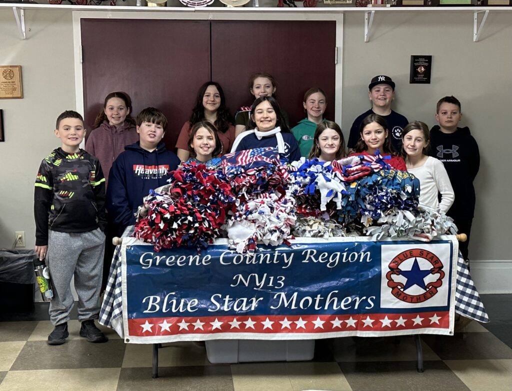 CES Student Council Poses for Group Photo with bluestar MNothers banneer