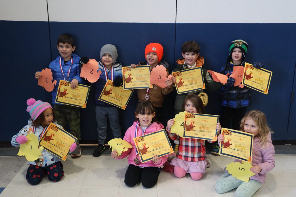 students holding certificates