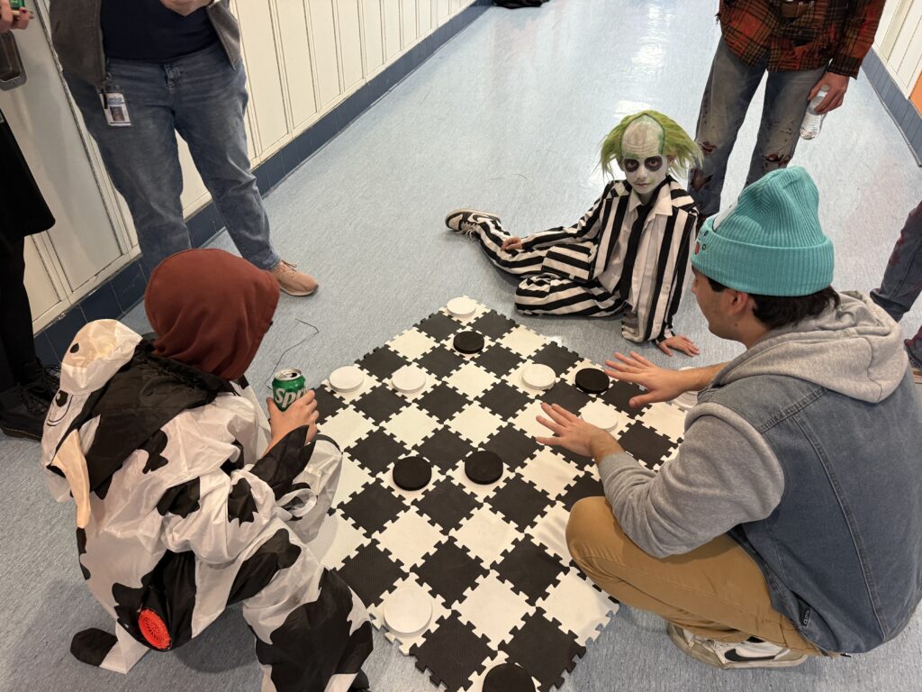 students playing checkers