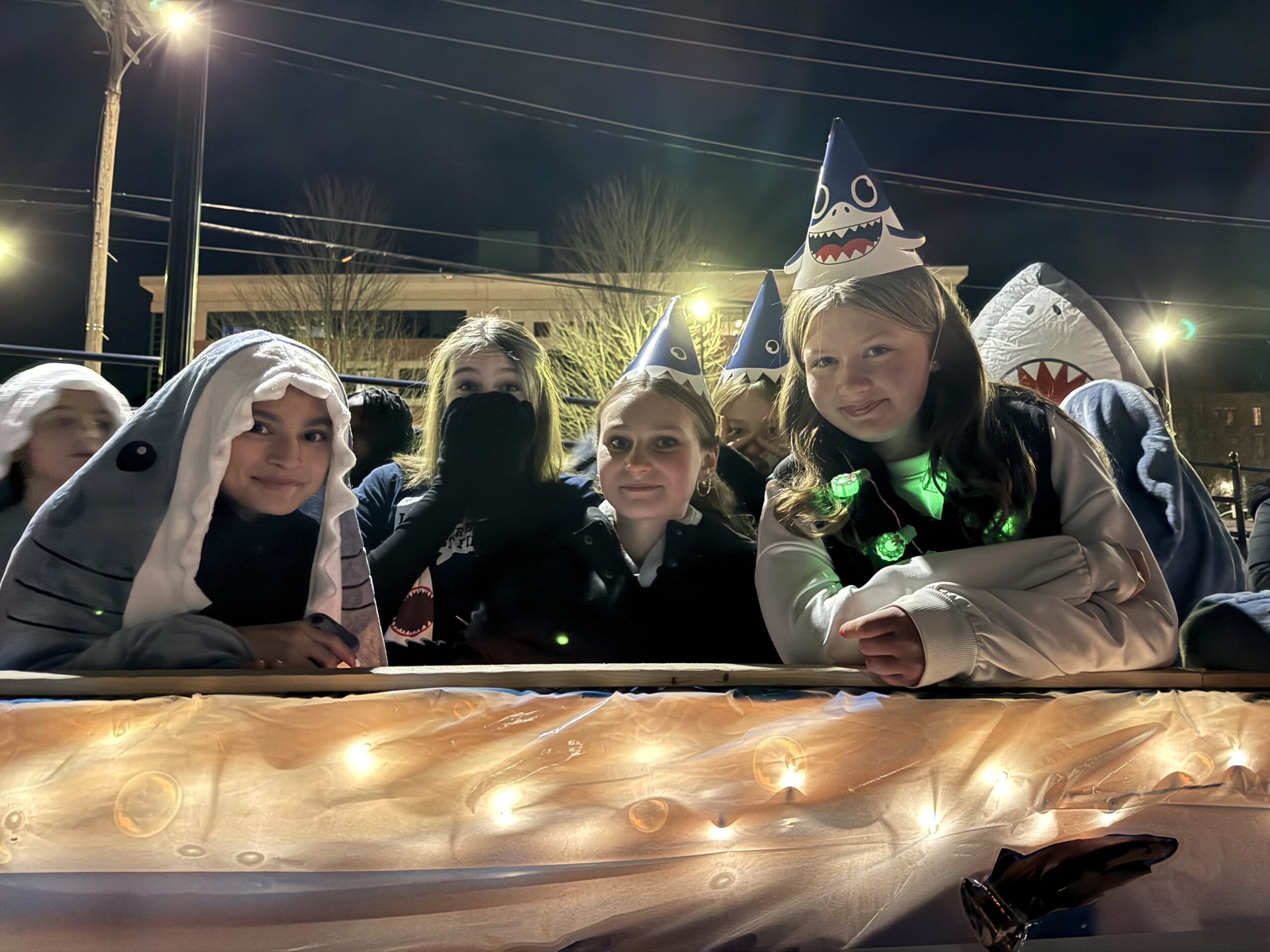 girls smiling on float