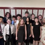 student musicians pose for group photo