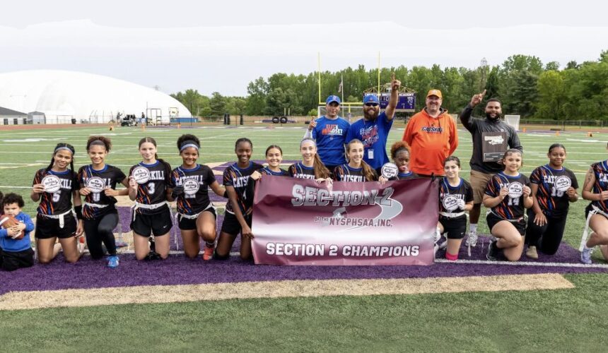 Catskill flag football team with Section 2 champion banner
