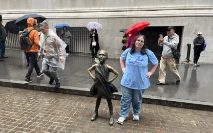 Zoey-Standing-Fearlessly-in-the-Rain-with-the-Fearless-Girl