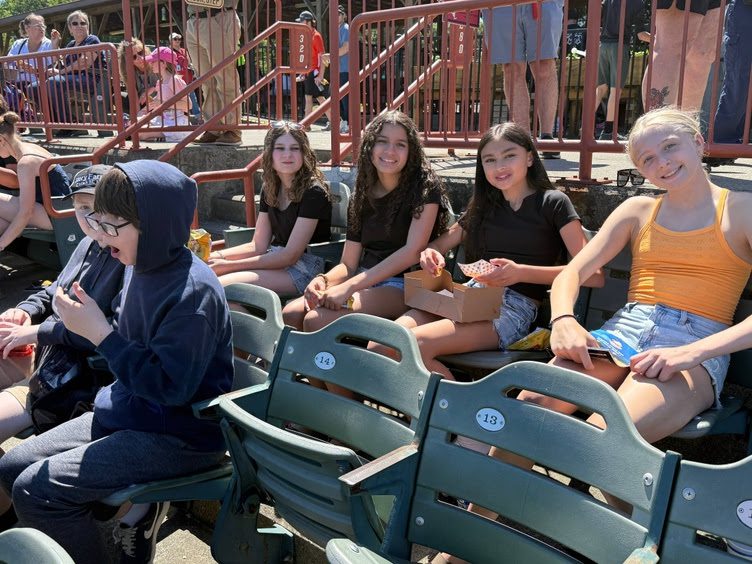 students sitting in stadium seats