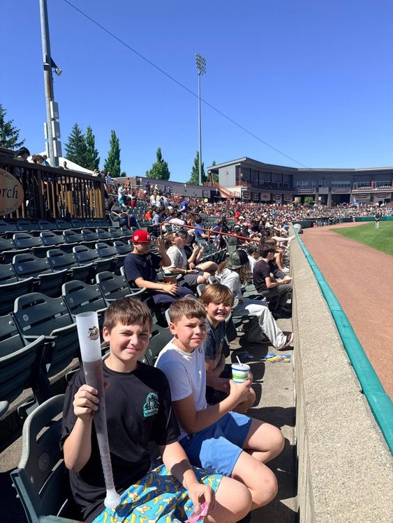 students sitting in stadium seats
